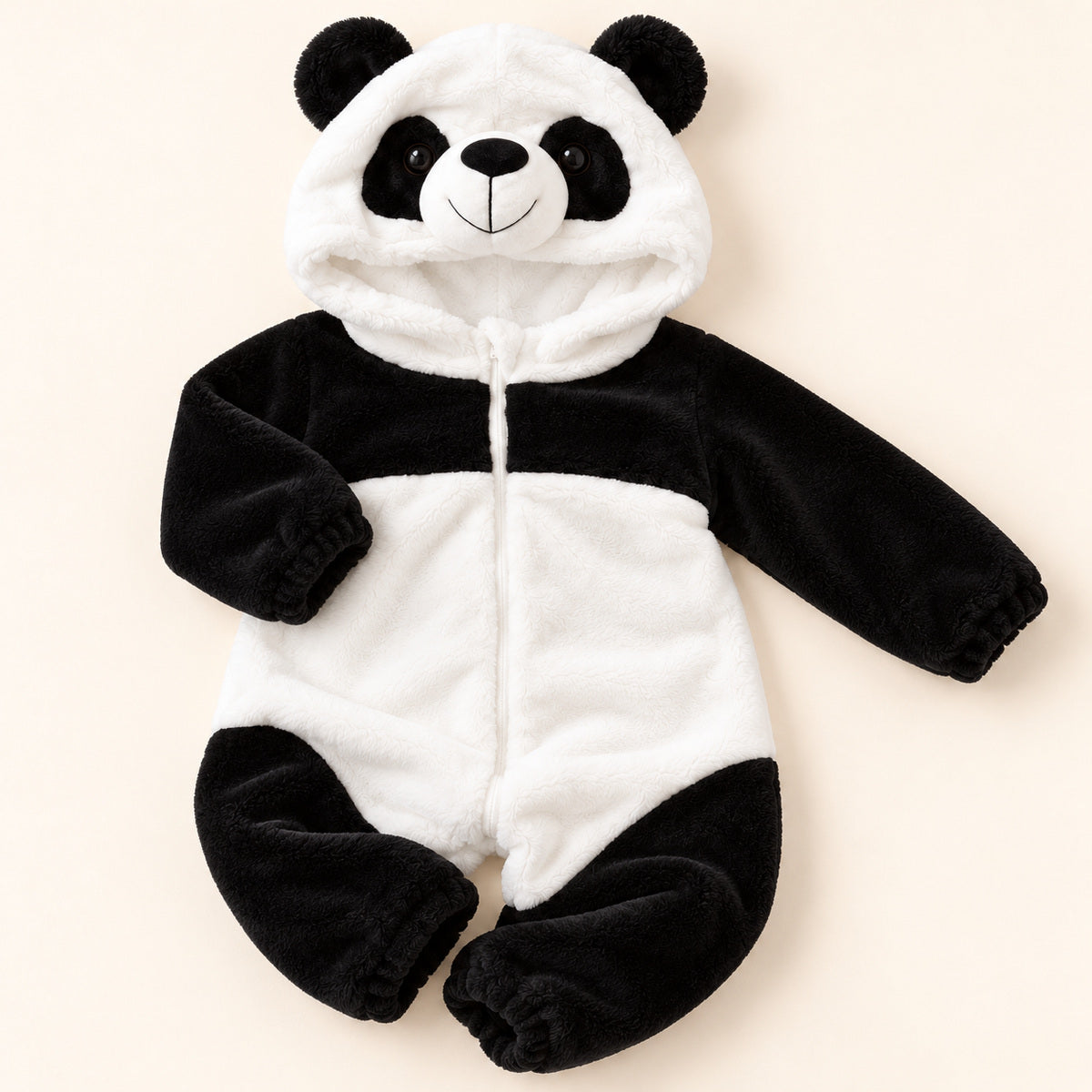 Flat lay of a panda hooded romper showing the hood, front closure and gathered cuffs.